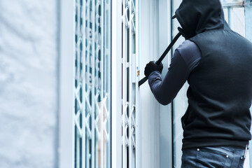Man, criminal and crowbar for home crime, house invasion and breaking entering attempt with tool....