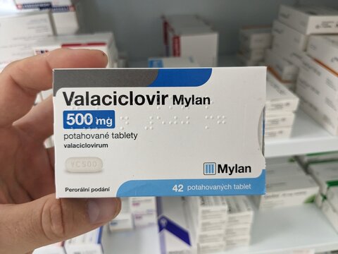 Prague, Czech Republic - July 10 2024: VALACICLOVIR MYLAN box of medication with VALACICLOVIR active substance by MYLAN, used for treatment of herpes and shingles.
