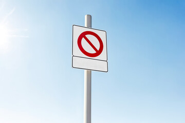 Prohibition sign against blue sky