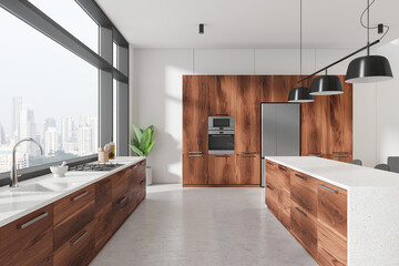 Luxury home kitchen interior with bar counter and fridge, panoramic window