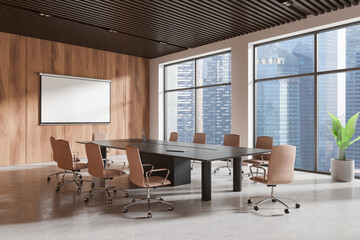 Meeting room interior with blank projection screen, panoramic window