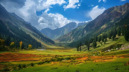 Fototapeta premium Majestic view of beautiful lush green valley with trees and colorful grass against picturesque high mountains. 