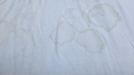 Closeup dirty pillows with saliva stains for long using, need to clean or change. Concept : unhygienic sleeping equipment, source of germs or dust mites