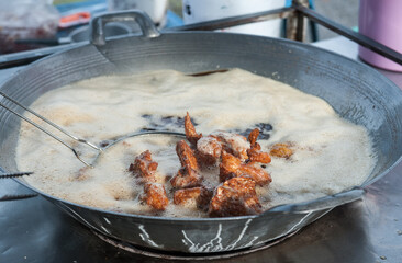 Fried chicken in a pan
