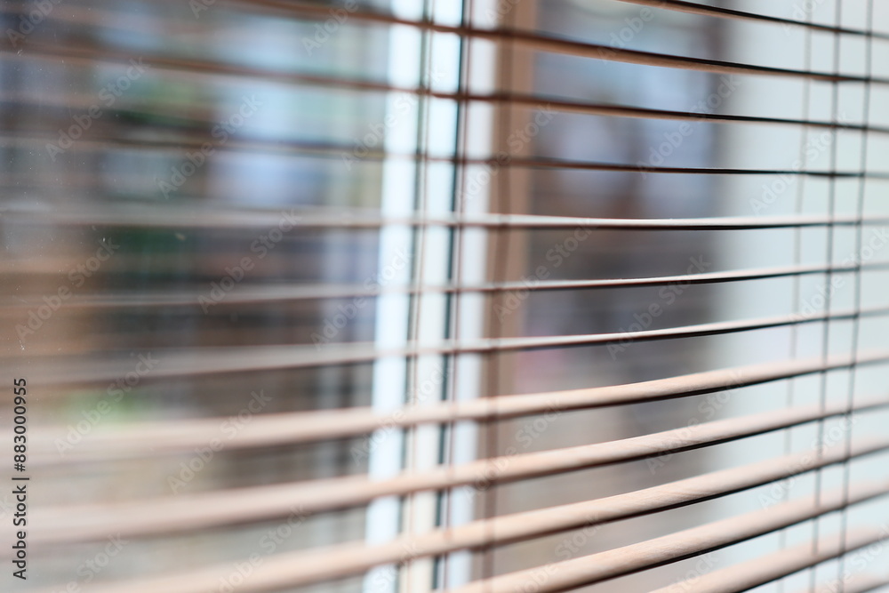Aufkleber a close-up shot of a window with blinds closed
