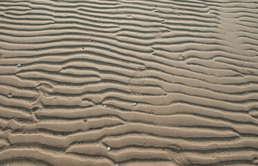 Traces of sand patterns on the beach
