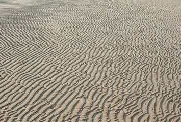 Traces of sand patterns on the beach