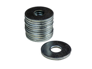 Plain and flat steel washers. A scattering of metal washers for bolts and screws. Construction and repair supplies  
