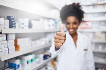 Woman, medicine and thumbs up with healthcare shop, shelf and prescription care pills. Pharmacist, retail store and supply of approved supplements, vitamins and minerals for vitality and dispensary