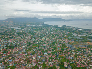 Aerial drone view of big city skyline scenery in Banda Aceh, Aceh, Indonesia.