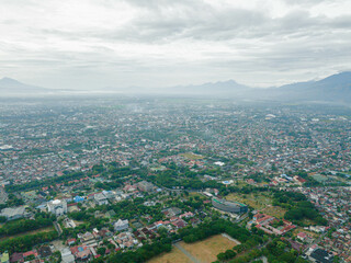 Aerial drone view of big city skyline scenery in Banda Aceh, Aceh, Indonesia.