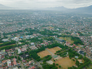 Aerial drone view of big city skyline scenery in Banda Aceh, Aceh, Indonesia.