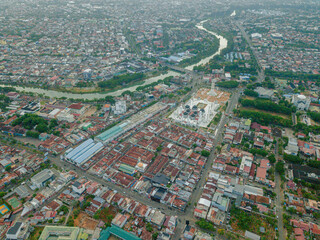 Aerial drone view of big city skyline scenery in Banda Aceh, Aceh, Indonesia.
