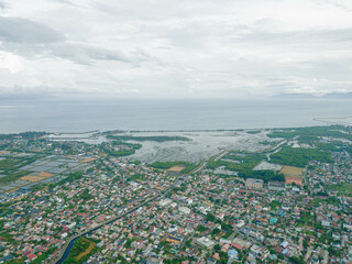 Aerial drone view of big city skyline scenery in Banda Aceh, Aceh, Indonesia.
