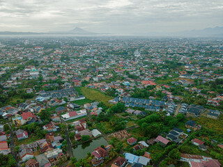 Aerial drone view of big city skyline scenery in Banda Aceh, Aceh, Indonesia.