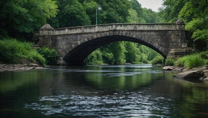 Fototapeta premium An old stone bridge spanning a gently flowing river