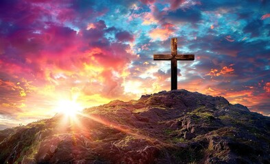 Fototapeta premium Sunset illuminates the cross on the hill casting a warm glow of hope