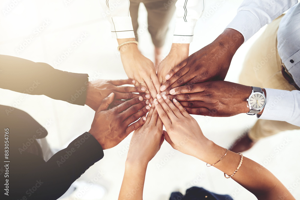 Wall mural Business people, unity and hands together in office for diversity, support and collaboration. Connection, solidarity and employees with goal, team building or celebration in workplace from above.