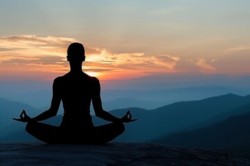 Silhouette of a person meditating in the lotus position at sunrise, with a serene mountain landscape in the background.