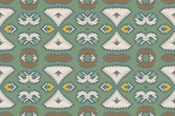 Ikat seamless pattern in tribal, folk embroidery, Mexican style. Aztec geometric art ornament print. Design for carpet, wallpaper, clothing, wrapping, fabric.