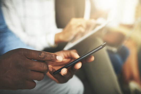 Phone, hands and people in waiting room for job search, recruitment opportunity and online application. Technology, scroll and employees in hr office for interview, internship or registration on web