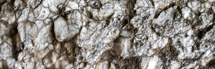 Abstract texture of natural stone. Unique lines, cracks and damage of natural stone close-up. Abstract texture stones, natural patterns for design art work.