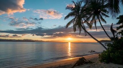 Sunset over a Fiji beach with palm trees and tranquil ocean views