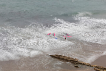 Itzurun beach in the city of Zumaia (Euskadi), in northern Spain, famous for its flysch. People learning to surf.
Long exposure photography technique.