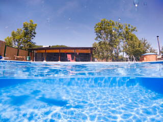 crystal clear blue water in swimming pool