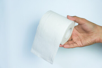 man hand with roll of toilet paper. isolated on white