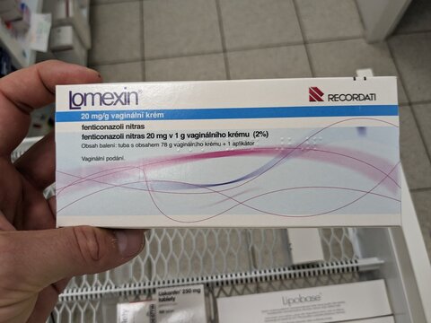 Prague, Czech Republic - July 10 2024: LOMEXIN VAGINAL CREAM box of medication with FENTICONAZOLE active substance by RECORDATI, used for treatment of vaginal and skin fungal infections.