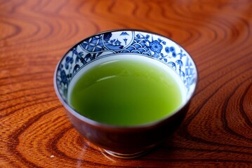 A hot green tea cup