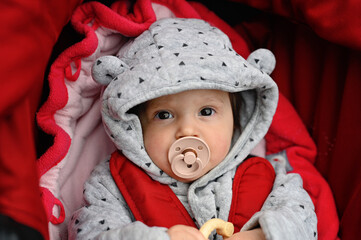 Baby girl with pacifier