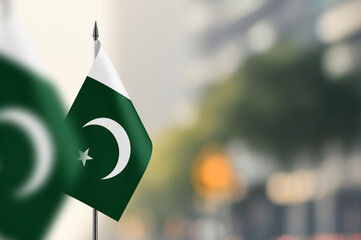 Small flags of Pakistan on a blurred background