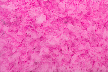 Fototapeta premium A delicate and lush photo zone made of pink tulle or organza.
