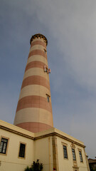 Obraz premium Lighthouse da barra de Aveiro Lighthouse in the coast of Aveiro, Portugal