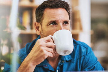 Man, drinking coffee and home for break, relax and comfort with thinking, planning and ideas for...