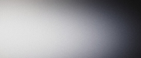 Obraz premium Light is fading on a grainy metallic surface with gradient texture