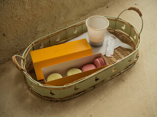 Espresso in a compostable cup and Macaroons on a Tray: Horizontal Close-Up of an Italian Veranda.