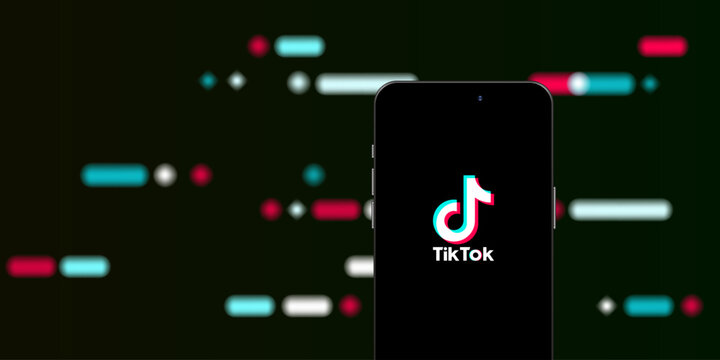 Ho Chi Minh City, Viet Nam - July 14, 2024. Illustration of smart phone with Tiktok, tik tok logo on colorful background, a popular social network on the internet.