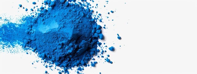 Obraz premium A blue powder mound sits atop a white table Nearby, a paper bearing a blue heart rests