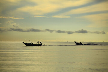 Obraz premium Boat floats near the shore in gulf of Thailand, Adventure Lifestyle 
