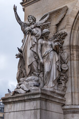 Architectural details of famous neo-baroque building Opera National de Paris. Grand Opera (Garnier...