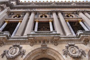 Architectural details of famous neo-baroque building Opera National de Paris. Grand Opera (Garnier...