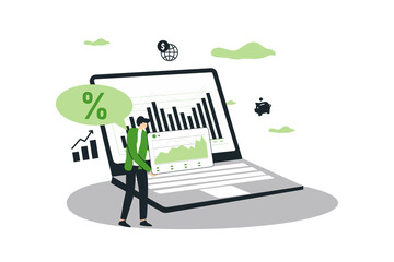 Person standing with laptop working and looking at financial and business diagram and graph