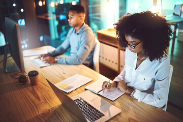 Laptop, notes and business woman in office at night with research for wealth management report with...