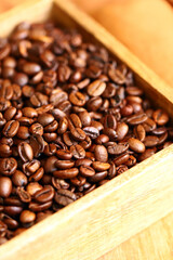 coffee beans in a wooden box