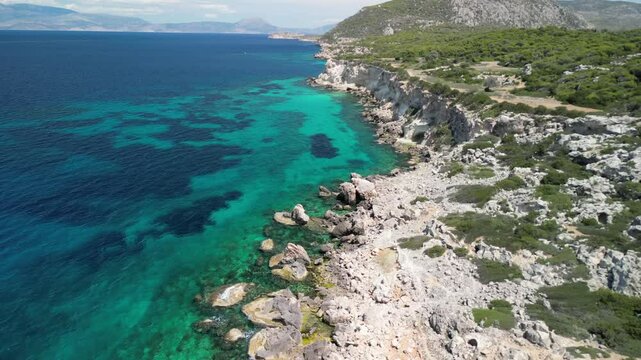 Aerial video over cliffs near Lighthouse Melagavi, Greece