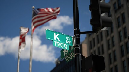 K street nw and 20th street nw street signs in downtown Washington DC symbolizing lobbying and corruption in nations capital © Robert Peak