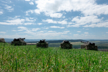 Naklejka premium A historical cannon at the Spis castle in Slovakia symbolically aimed behind the walls to defend it